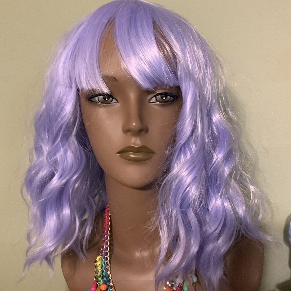 Beautiful thick & stylish wig.  See all photos lavender & wavy.